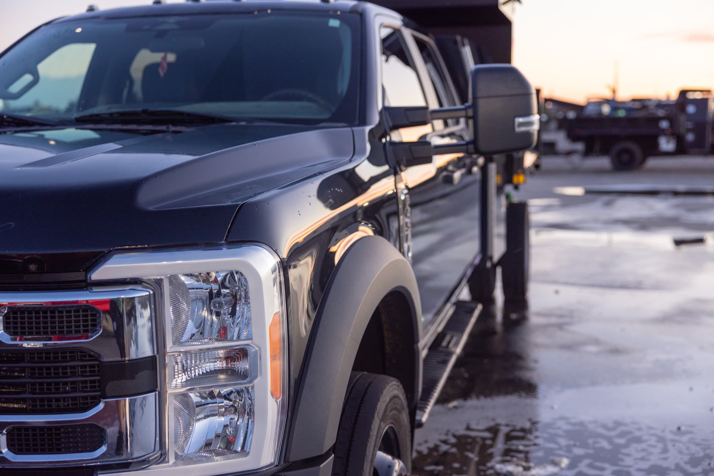 Freshly detailed Super Duty catching first light after a dawn wash